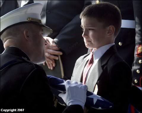 Son Bravely Accepts American Flag Pictures, Images and Photos
