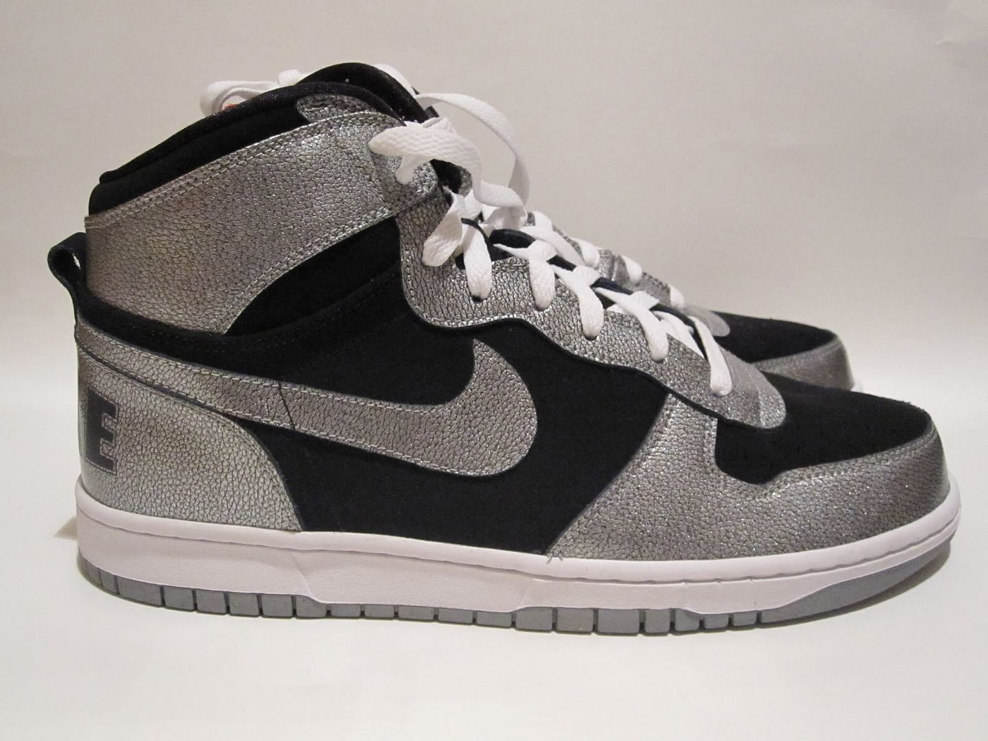 silver and black dunks